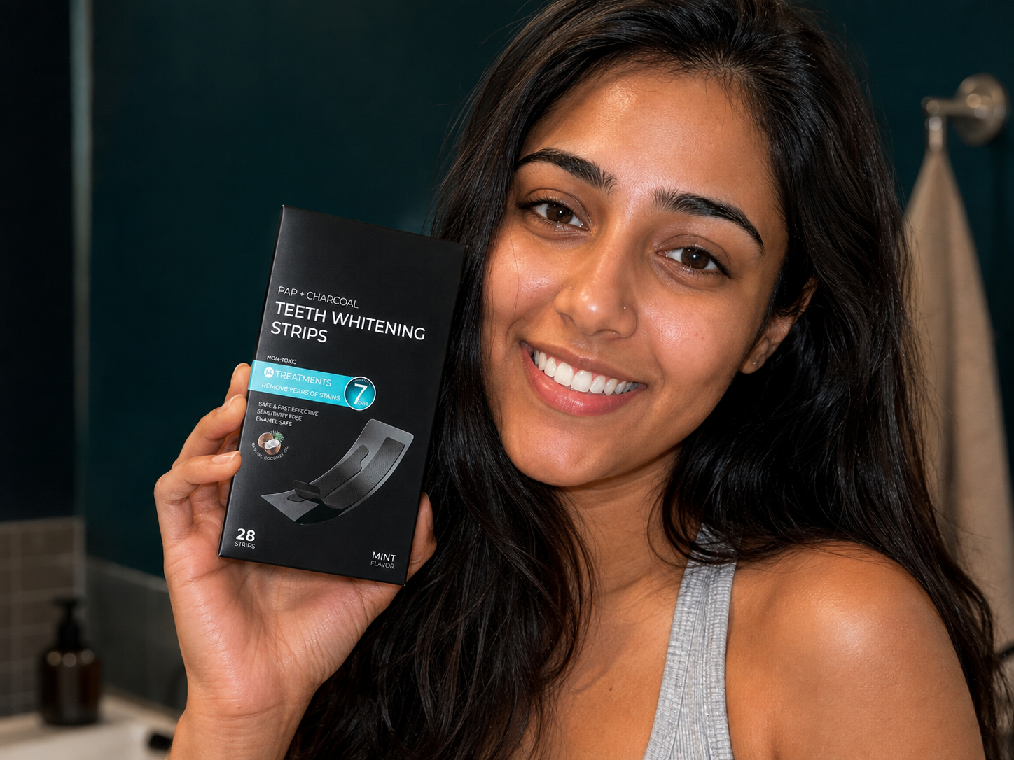 BetterSmile customer using Charcoal Whitening Strip